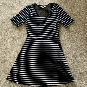 A line navy and white stripped dress with black lace detail in back